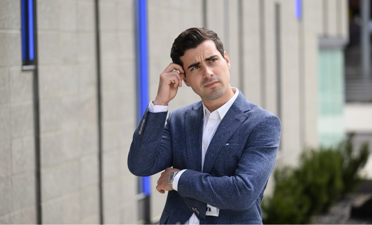 man with arms crossed